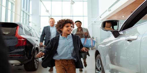 ey-family-looking-for-their-new-car-at-the car-dealership.jpg